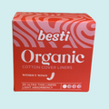 Box of besti Organic Cotton Cover Liners on a light blue background