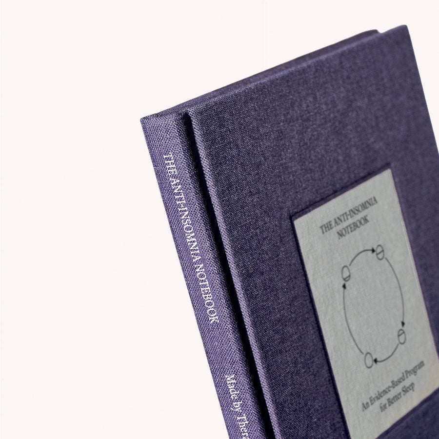 Purple notebook titled 'The Anti-Ansomnia Notebook' on a white background