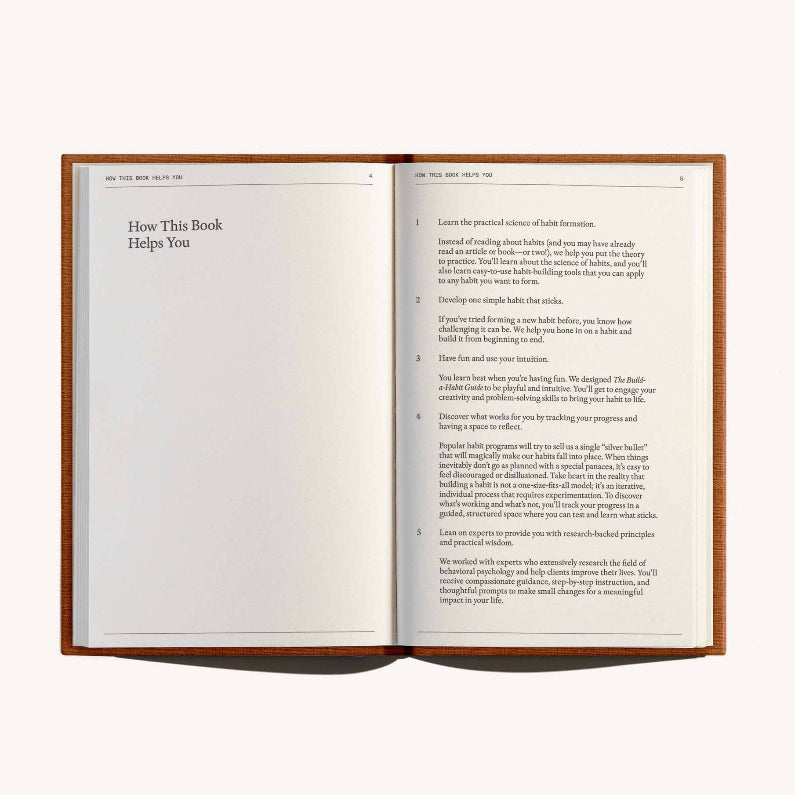 Open book with text on a white background