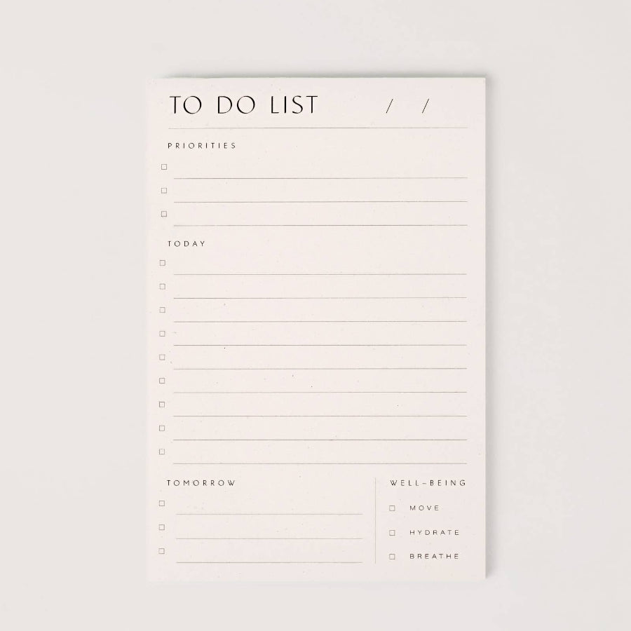 To-do list with sections for priorities, today, tomorrow, and well-being on a light gray background.