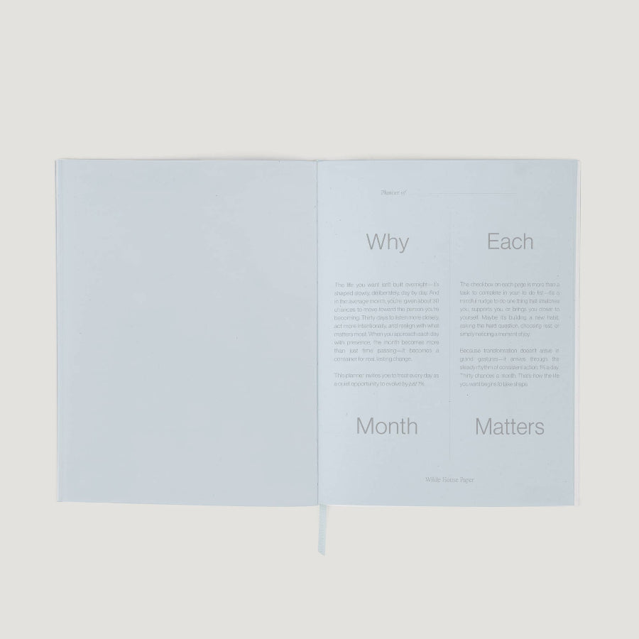 Open book with text on a light background