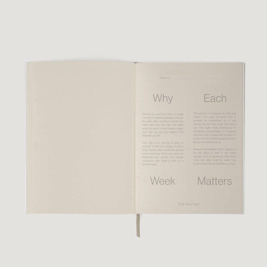 Open book with text on a white background