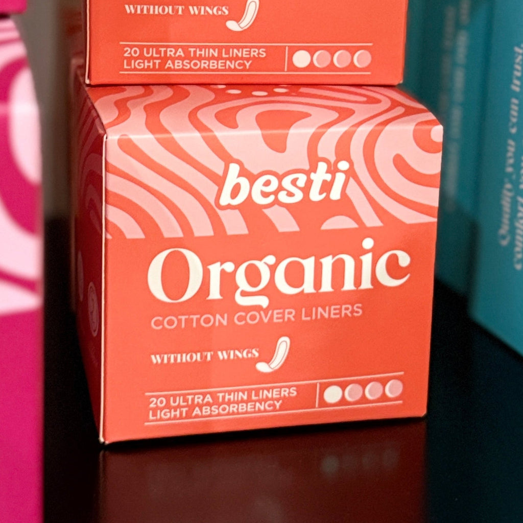 Boxes of besti Organic cotton products on a shelf
